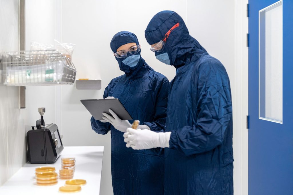 a couple of people wearing masks and gloves and gloves